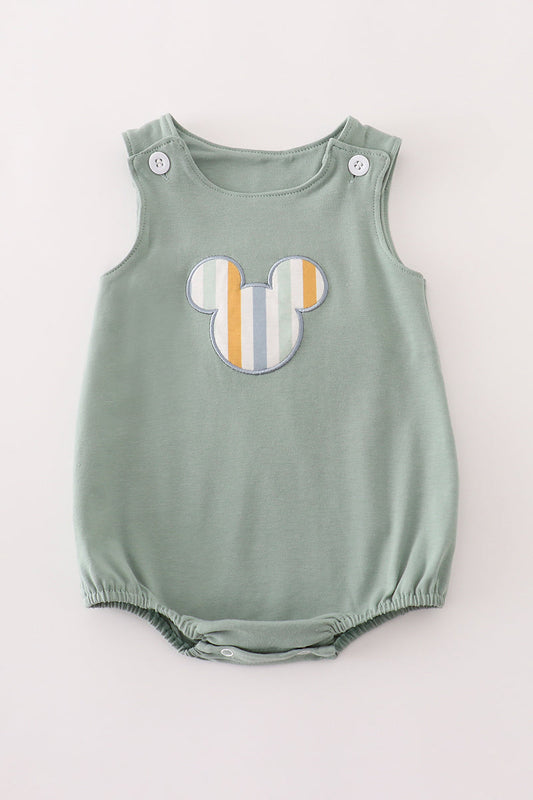 Green character applique bubble