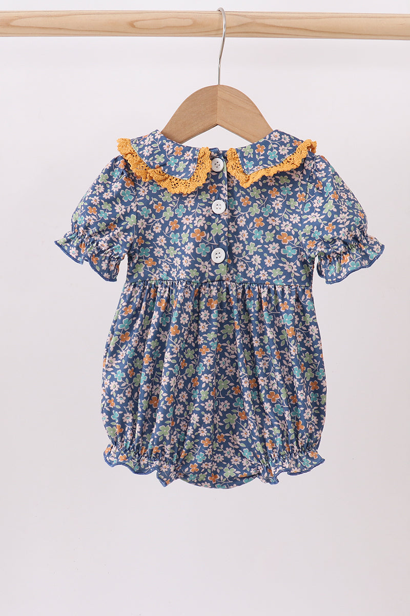 Navy floral smocked ruffle bubble